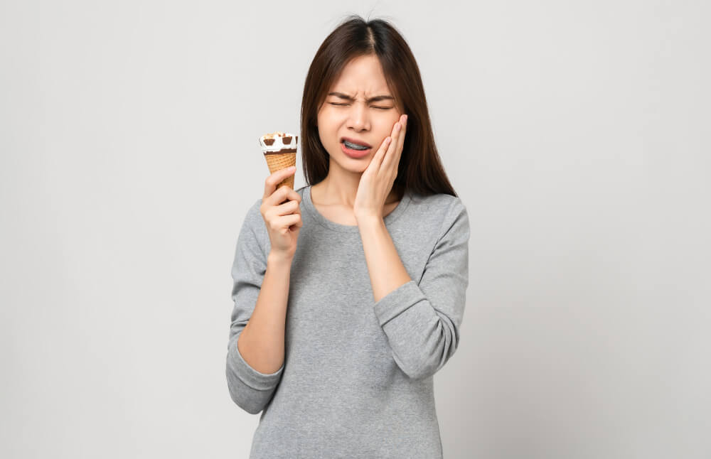 Tooth Sensitivity Causes: Why Your Teeth Hurt and How to Find Relief