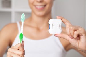 top 4 amazing benefits of brushing and flossing from main beach dental